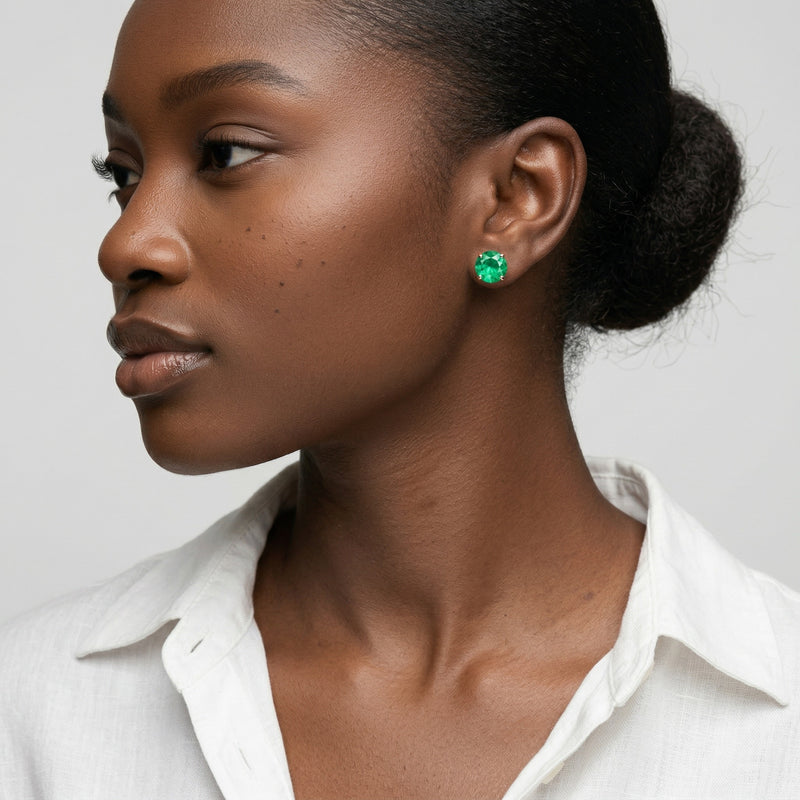 emerald birthstone stud earrings in rose gold finish — model view