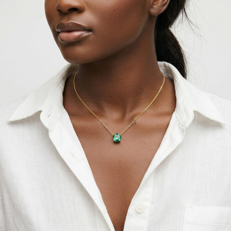 emerald birthstone necklace in yellow gold finish — model view