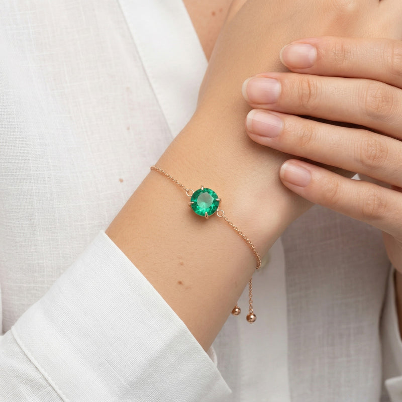emerald birthstone bracelet in rose gold finish — model view