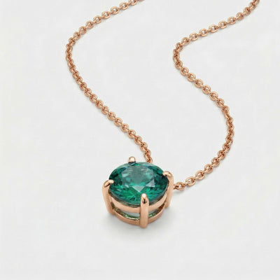 emerald birthstone necklace in rose gold finish — side view