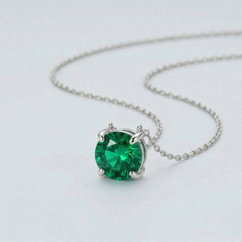 emerald birthstone necklace in white gold finish — side view