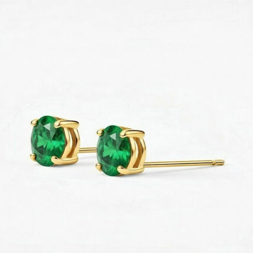 emerald birthstone stud earrings in yellow gold finish — side view