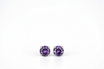 alexandrite birthstone stud earrings in white gold finish — front view