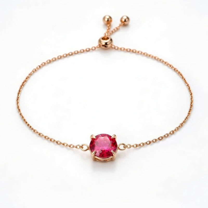 ruby birthstone bracelet in rose gold finish — front view