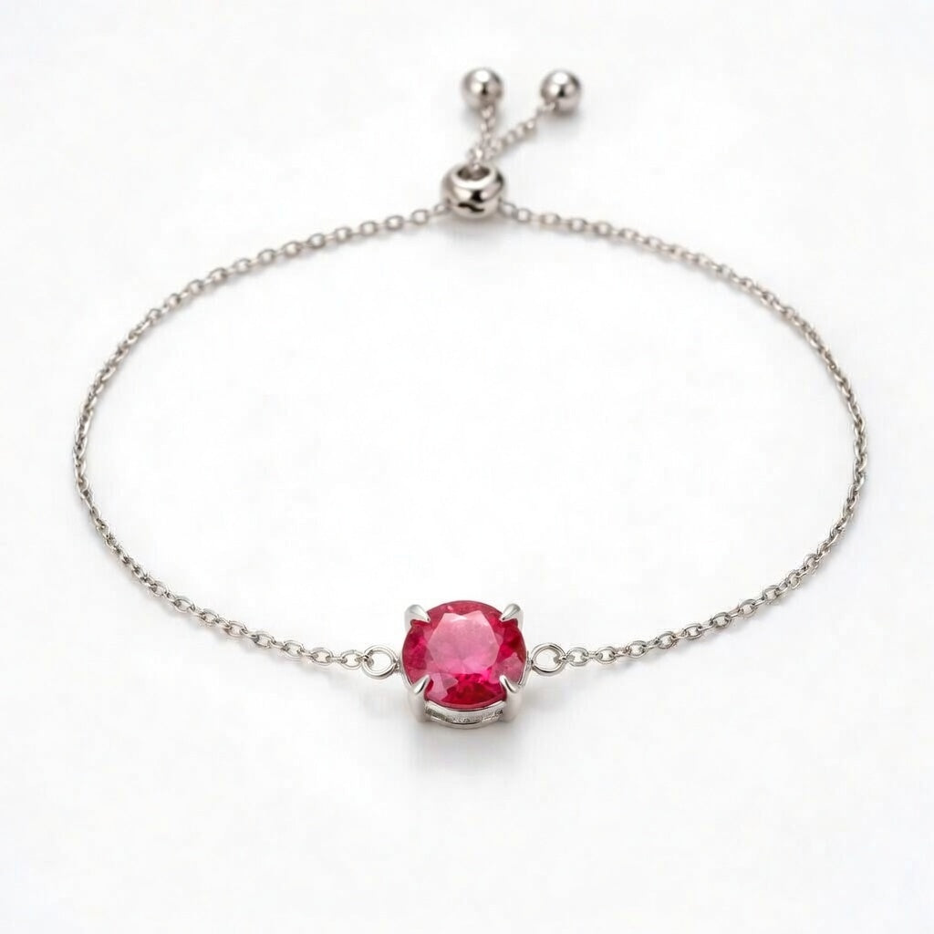 ruby birthstone bracelet in white gold finish — front view