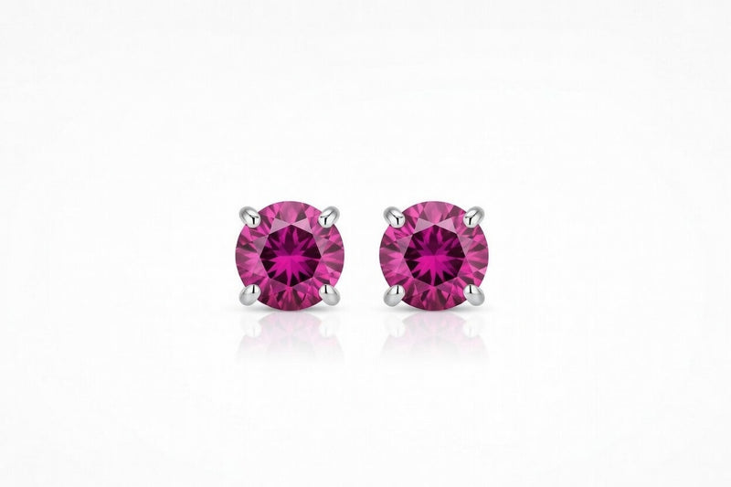 ruby birthstone stud earrings in white gold finish — front view