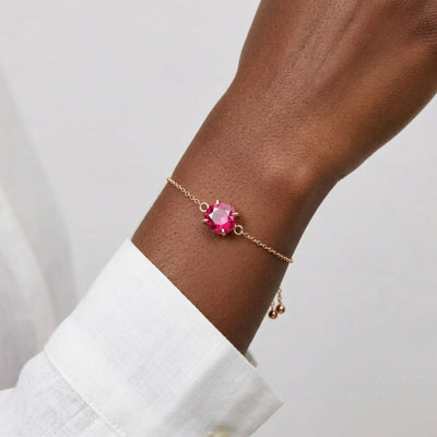ruby birthstone bracelet in rose gold finish — model view