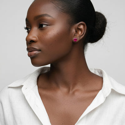 ruby birthstone stud earrings in white gold finish — model view