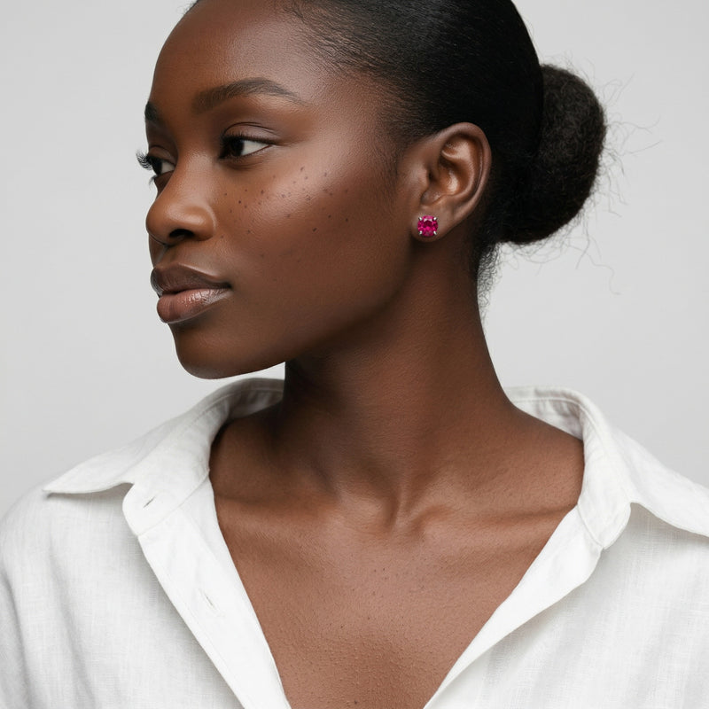 ruby birthstone stud earrings in white gold finish — model view