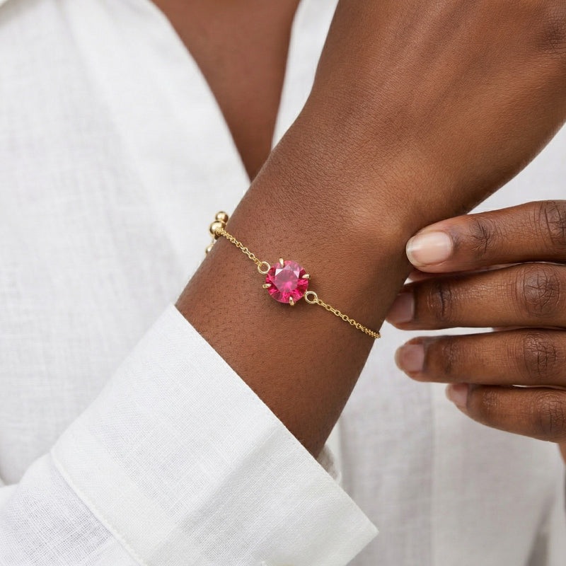 ruby birthstone bracelet in yellow gold finish — model view