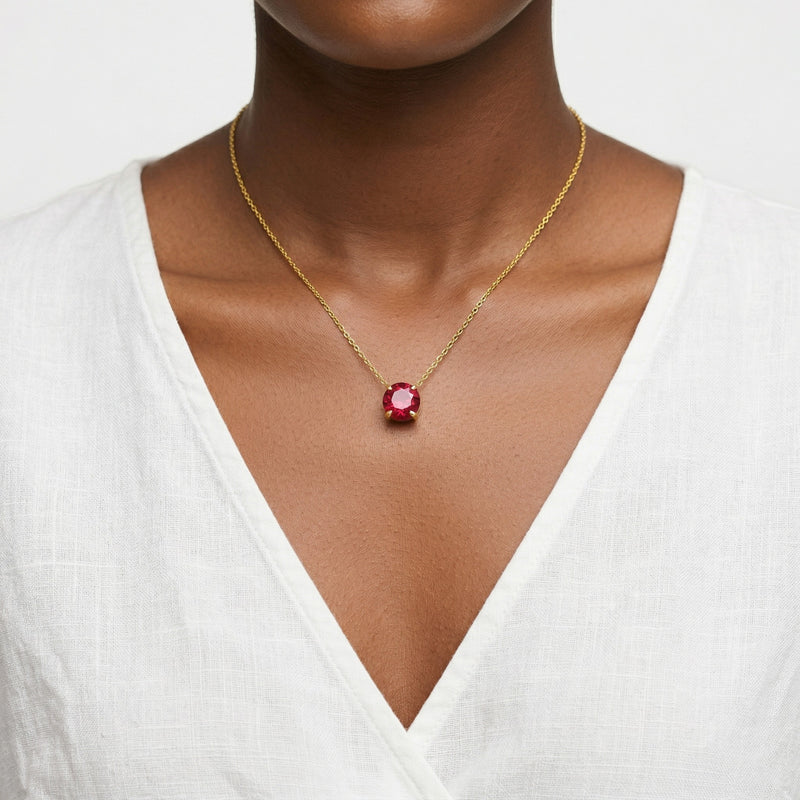 ruby birthstone necklace in yellow gold finish — model view