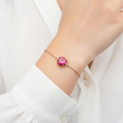 ruby birthstone bracelet in rose gold finish — model view