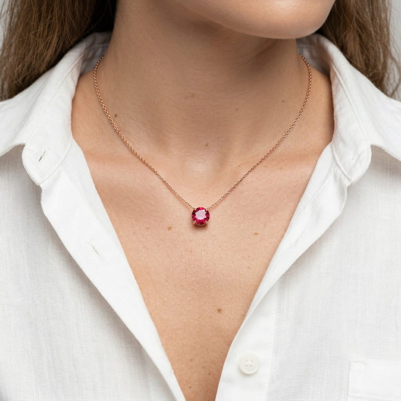ruby birthstone necklace in rose gold finish — model view