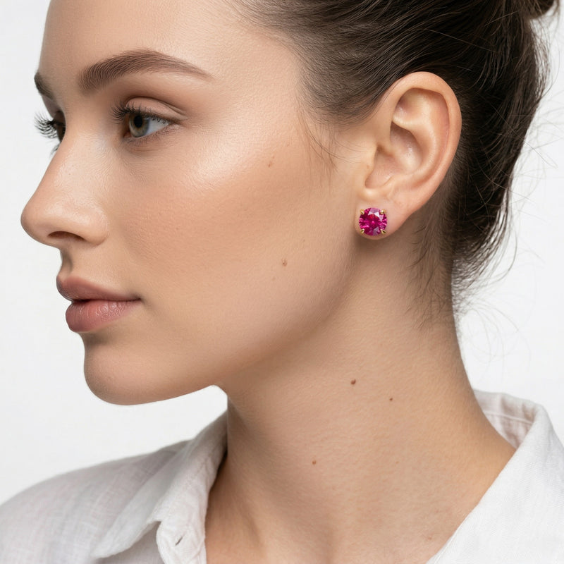 ruby birthstone stud earrings in yellow gold finish — model view