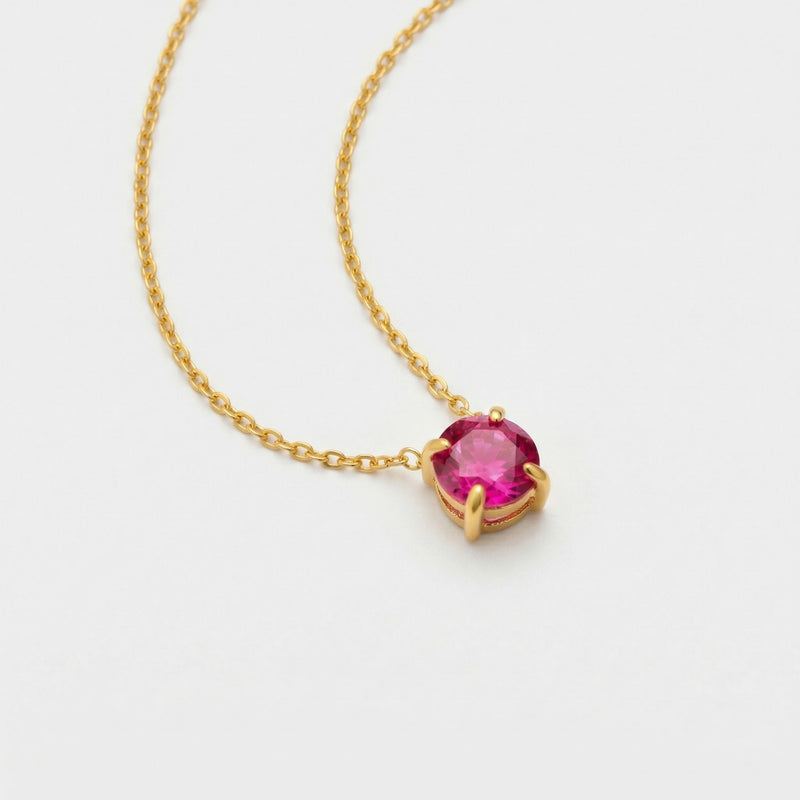 ruby birthstone necklace in yellow gold finish — side view