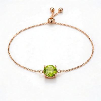 peridot birthstone bracelet in rose gold finish — front view