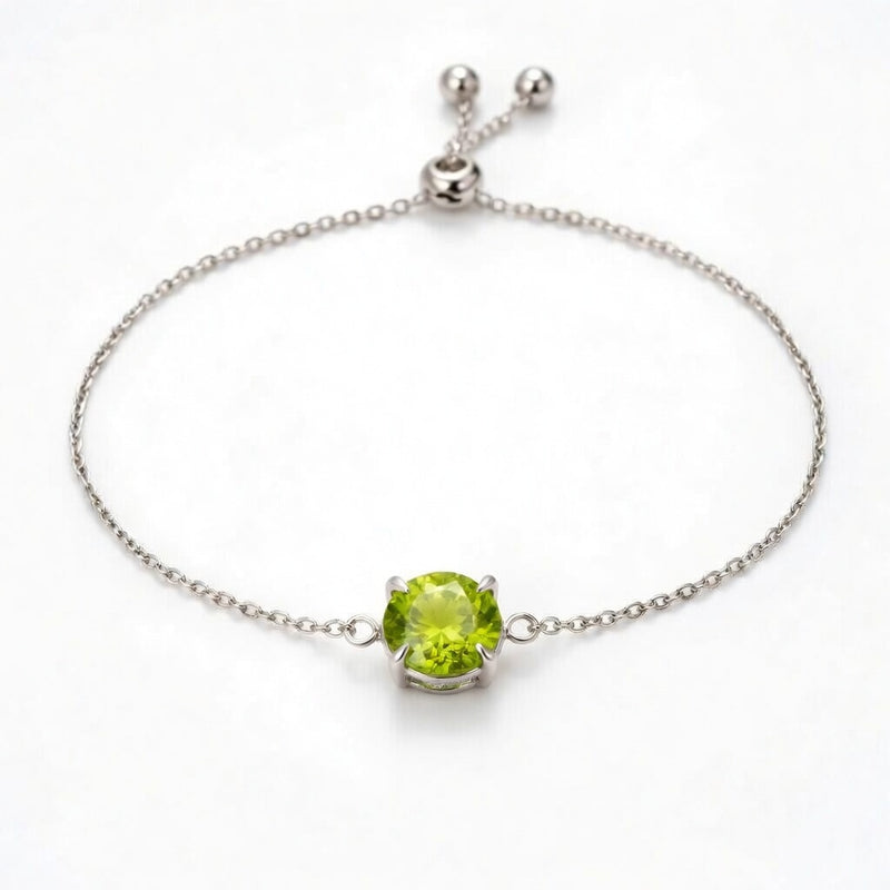 peridot birthstone bracelet in white gold finish — front view