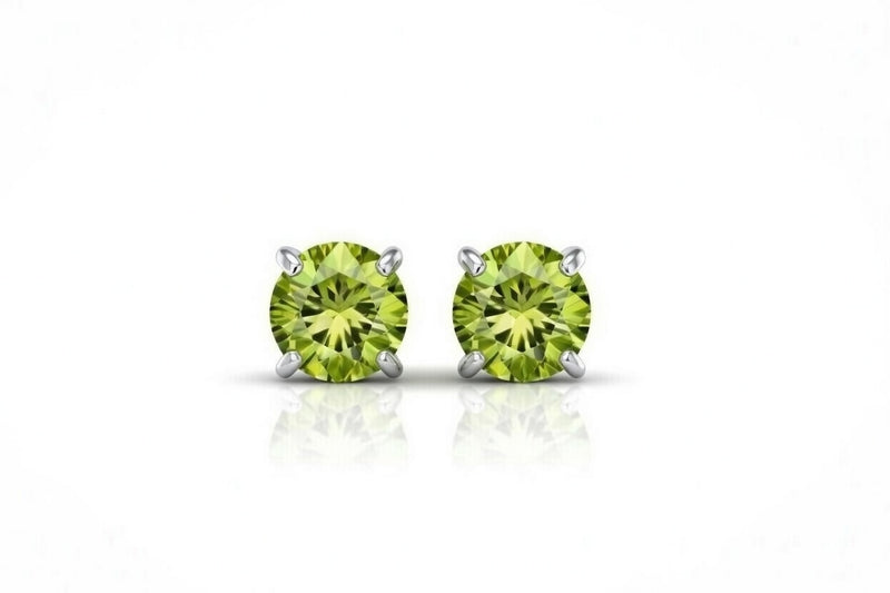 peridot birthstone stud earrings in white gold finish — front view
