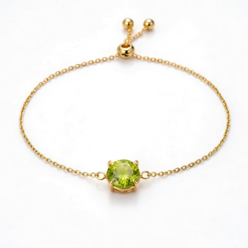 peridot birthstone bracelet in yellow gold finish — front view