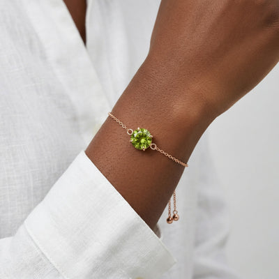 peridot birthstone bracelet in rose gold finish — model view