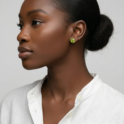 peridot birthstone stud earrings in rose gold finish — model view