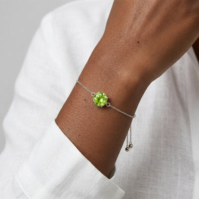 peridot birthstone bracelet in white gold finish — model view