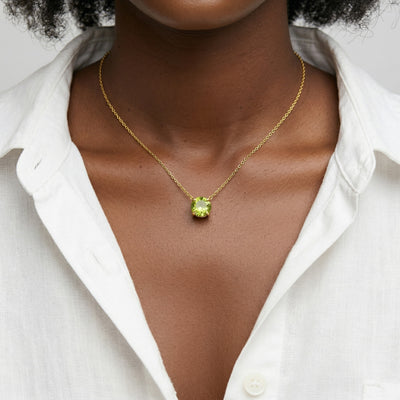 peridot birthstone necklace in yellow gold finish — model view