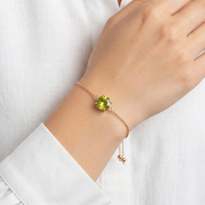 peridot birthstone bracelet in rose gold finish — model view