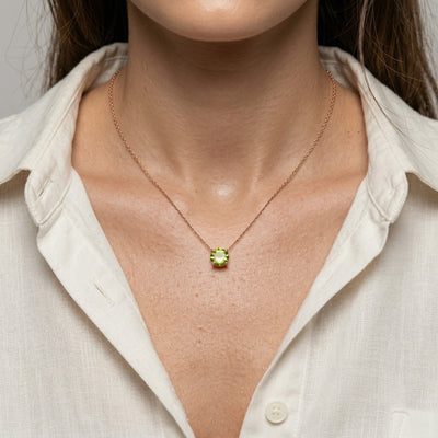 peridot birthstone necklace in rose gold finish — model view