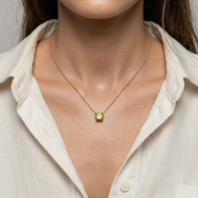 peridot birthstone necklace in rose gold finish — model view