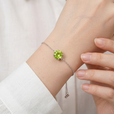 peridot birthstone bracelet in white gold finish — model view
