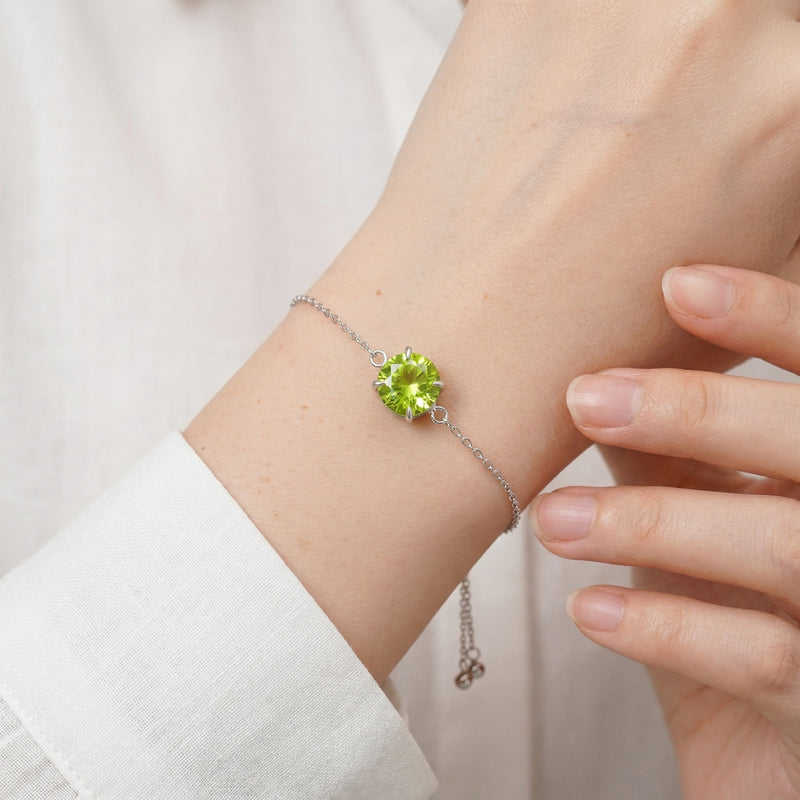 peridot birthstone bracelet in white gold finish — model view