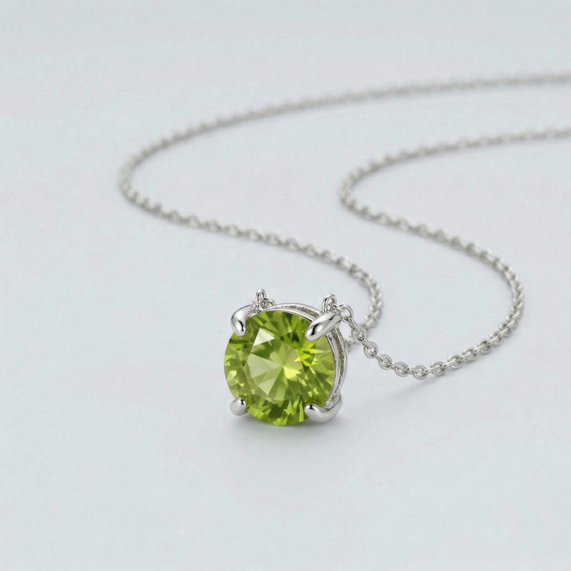 peridot birthstone necklace in white gold finish — side view