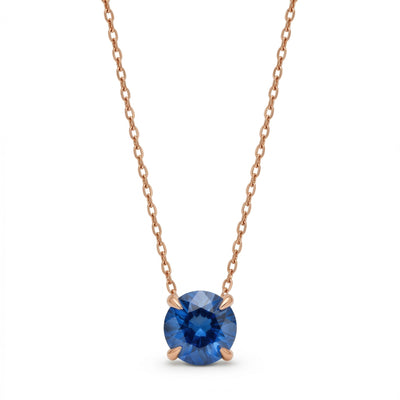 sapphire birthstone necklace in rose gold finish — front view
