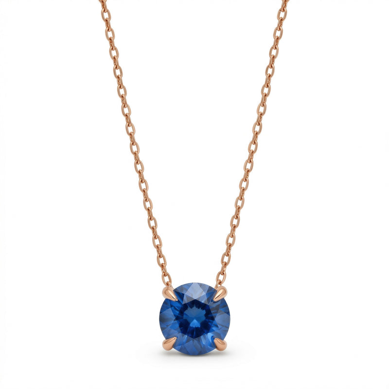 sapphire birthstone necklace in rose gold finish — front view