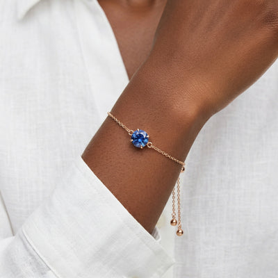 sapphire birthstone bracelet in rose gold finish — model view
