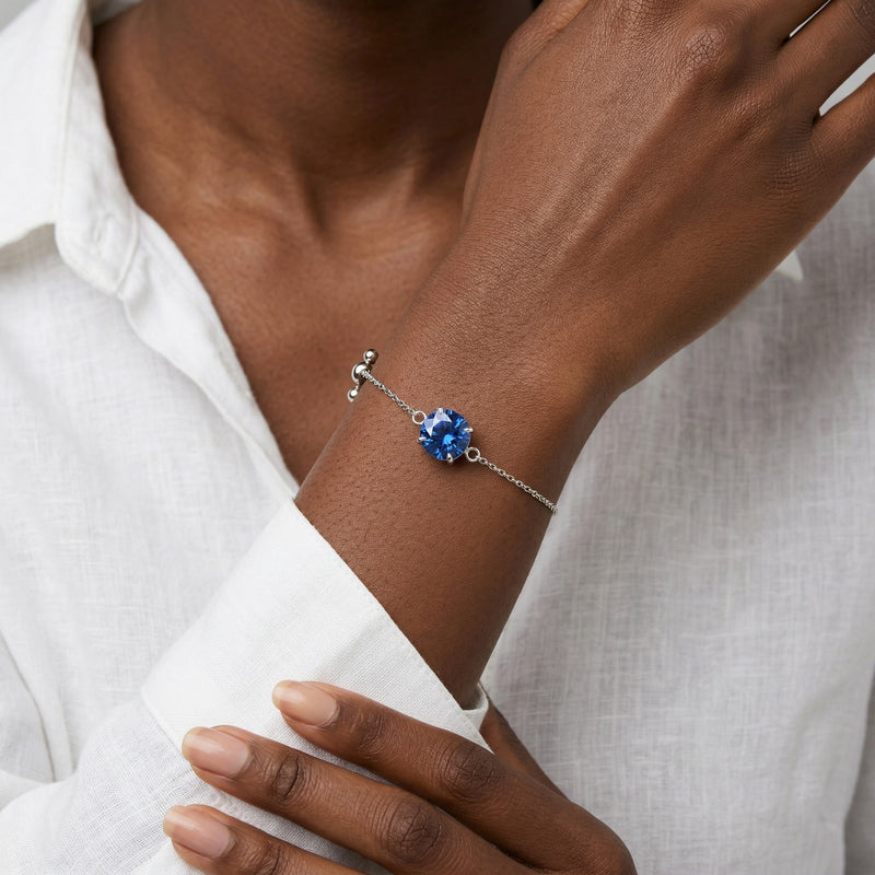 sapphire birthstone bracelet in white gold finish — model view