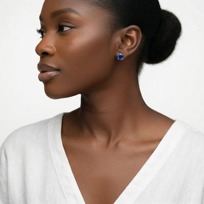sapphire birthstone stud earrings in white gold finish — model view
