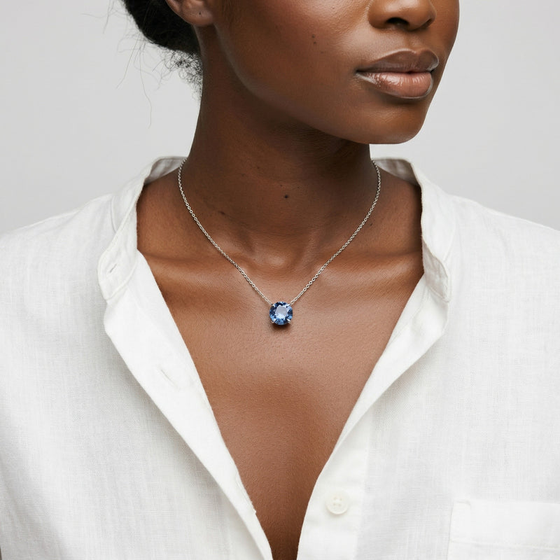 sapphire birthstone necklace in white gold finish — model view