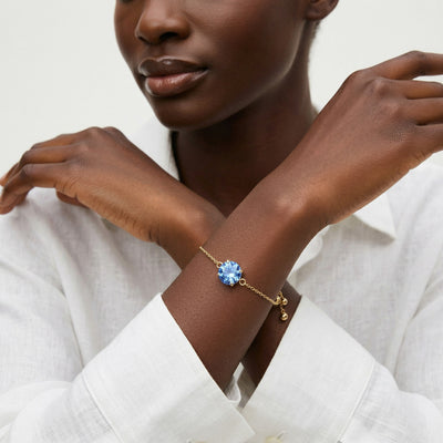 sapphire birthstone bracelet in yellow gold finish — model view
