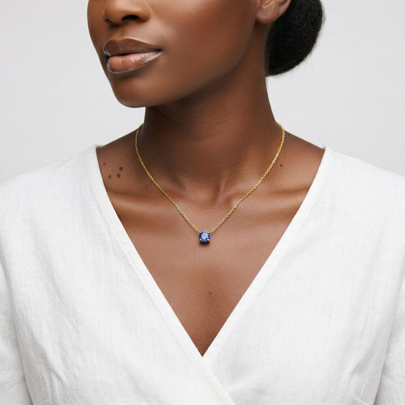 sapphire birthstone necklace in yellow gold finish — model view