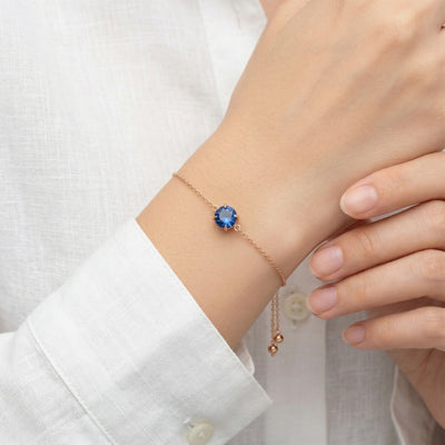 sapphire birthstone bracelet in rose gold finish — model view