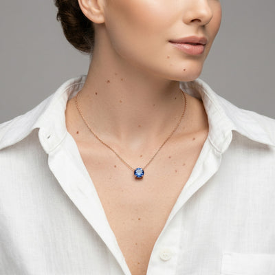 sapphire birthstone necklace in rose gold finish — model view