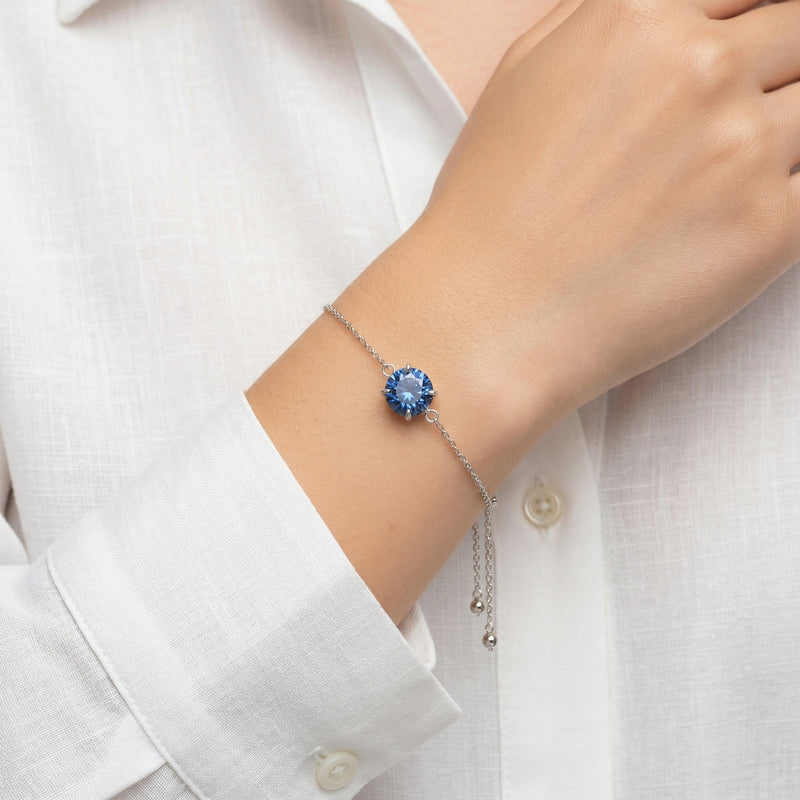 sapphire birthstone bracelet in white gold finish — model view