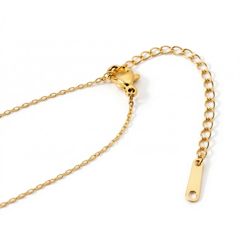 blue topaz birthstone necklace in yellow gold finish — back view