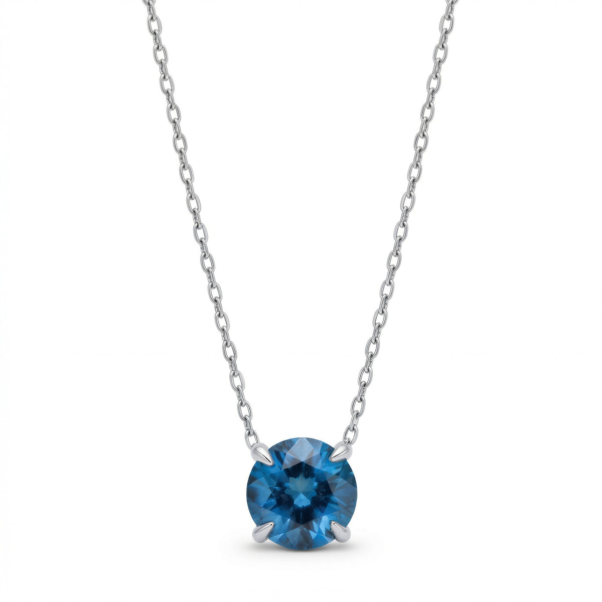 blue topaz birthstone necklace in white gold finish — front view