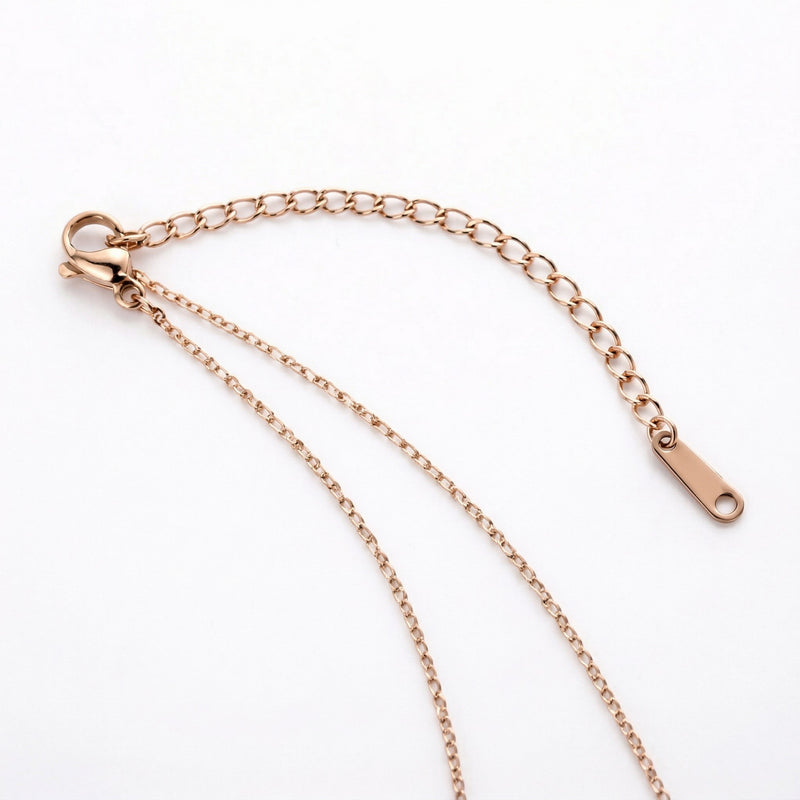 tanzanite birthstone necklace in rose gold finish — back view