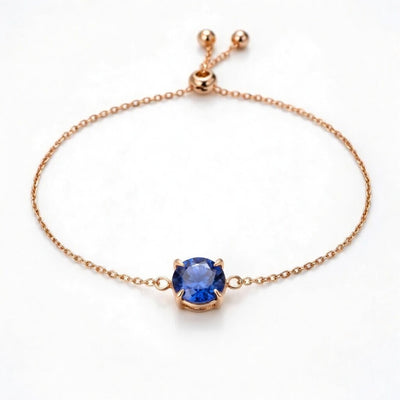 tanzanite birthstone bracelet in rose gold finish — front view