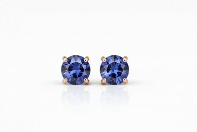 tanzanite birthstone stud earrings in rose gold finish — front view