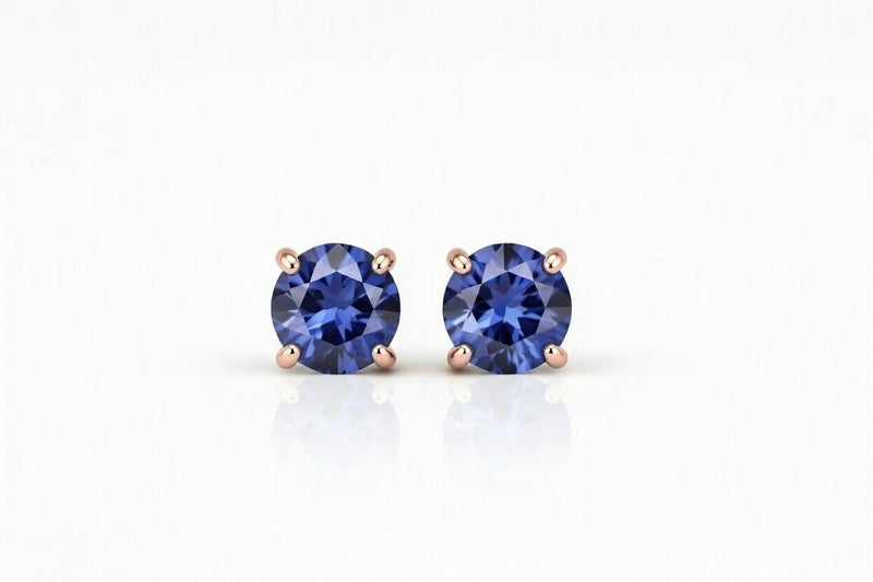 tanzanite birthstone stud earrings in rose gold finish — front view